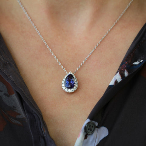 18kt White Gold Pear Tanzanite And Diamond Halo Pendant